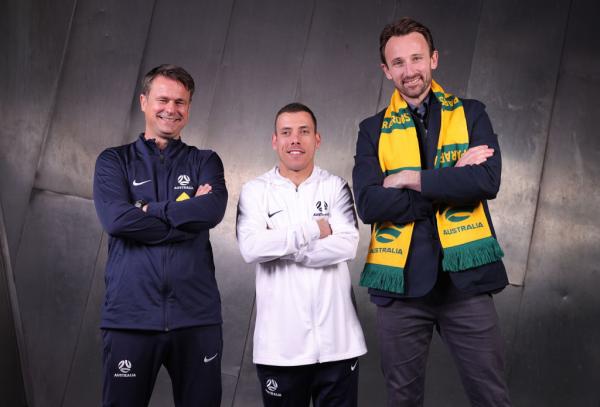 MELBOURNE, AUSTRALIA - OCTOBER 16: Kai Lammert, Head Coach of the CommBank Pararoos, Christian Tsangas, Goalkeeper of the CommBank Pararoos and Josh Kennedy, Former Socceroo pose for a portrait during the Australia Pararoos & ParaMatildas squad announcement at Federation Square on October 16, 2023 in Melbourne, Australia. (Photo by Kelly Defina/Getty Images for Football Australia)