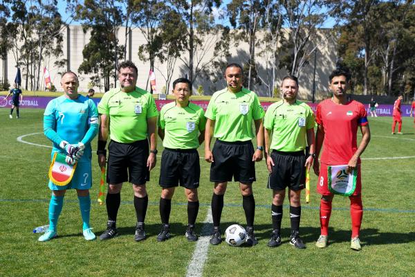 Captains David Barber and Hassan Safari, and referees, line up before CommBank Pararoos played Iran, IFCPF Matchday Two. 
